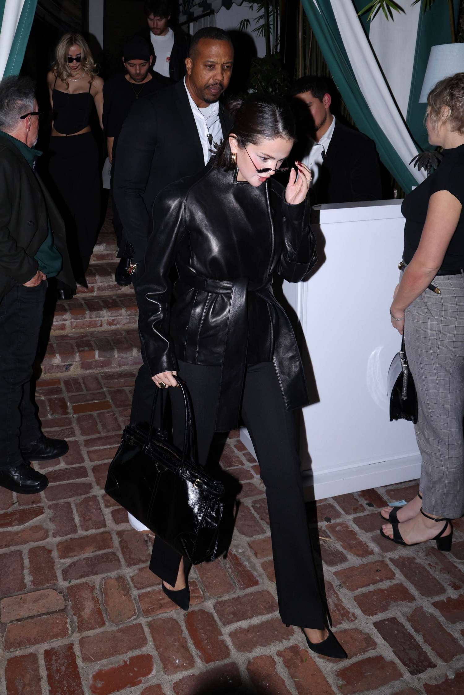 Selena_Gomez_-_At_Brooks_Nader27s_birthday_dinner_at_San_Vicente_Bungalows2C_West_Hollywood_CA_-_February_72C_2026_13.jpg