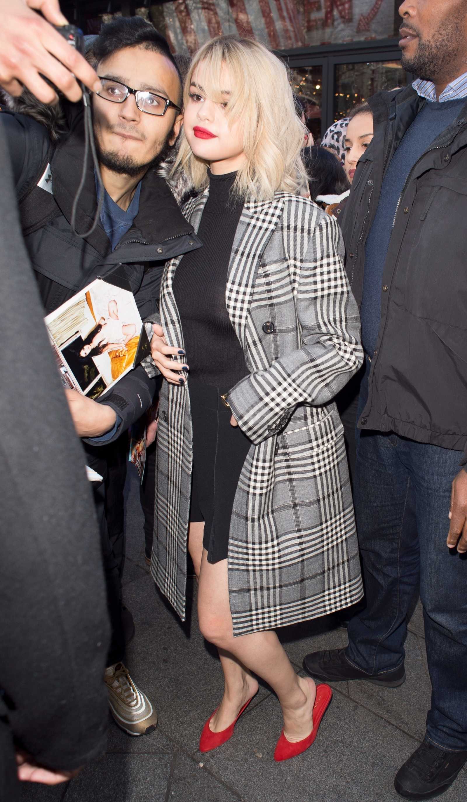 Selena_Gomez_-_At_Capital_Radio_in_London2C_UK_on_December_4-06.jpg
