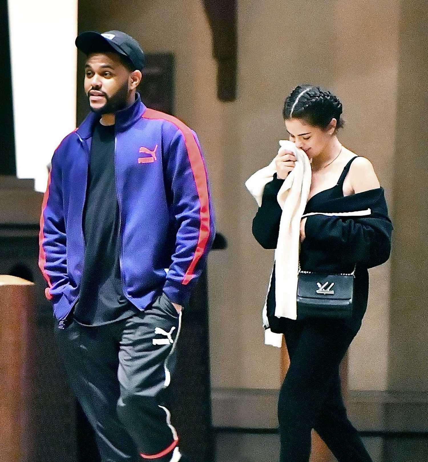 Selena_Gomez_-_At_Disneyland_with_The_Weeknd_in_Anaheim2C_CA_on_August_21-01.jpg