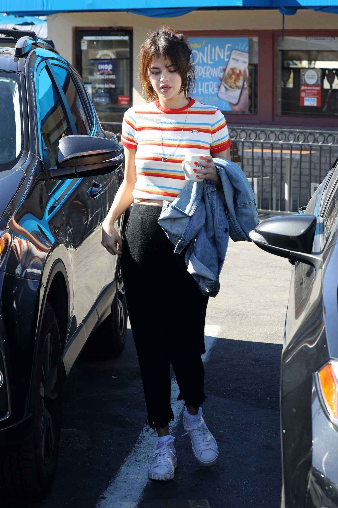 Selena_Gomez_-_At_IHOP_in_Encino2C_CA2C_on_February_7-07.jpg