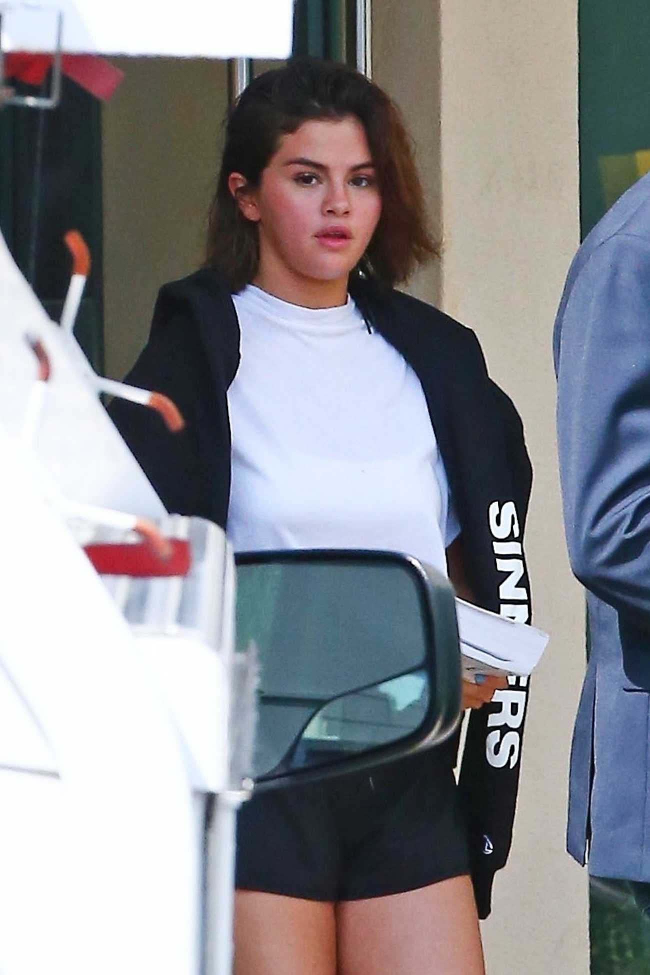Selena_Gomez_-_Hits_the_gym_in_Beverly_Hills2C_CA_April_22C_2018-02.jpg