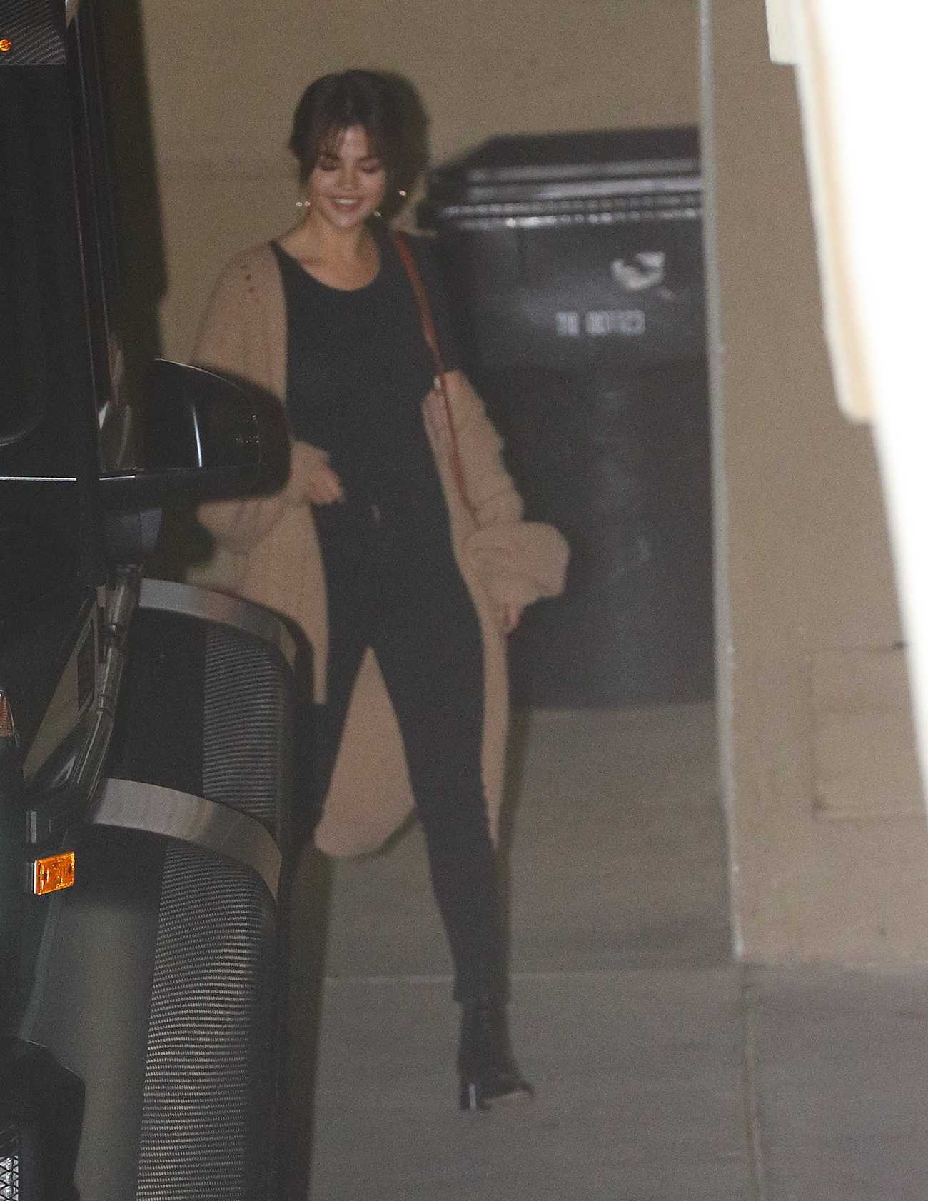 Selena_Gomez_-_Leaves_church_in_LA_on_March_72C_2018-02.jpg
