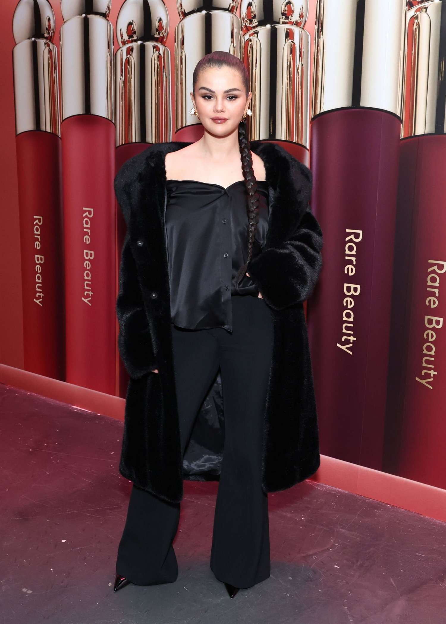 Selena_Gomez_-_Rare_Beauty_Soft_Pinch_Tinted_Lip_Oil_Collection_launch_event_in_New_York_March_292C_202301.jpg