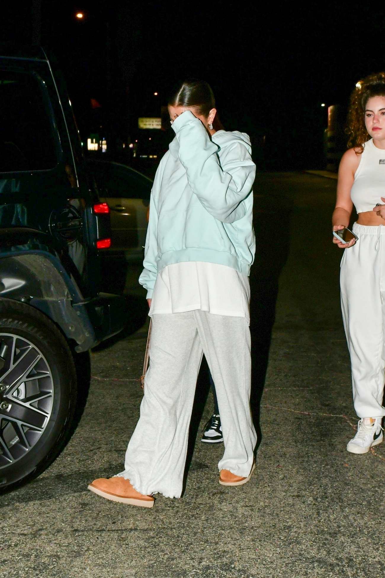 Selena_Gomez_-_Seen_leaving_a_bowling_alley_with_Francia_Raisa_in_Studio_City_August_142C_202303.jpg