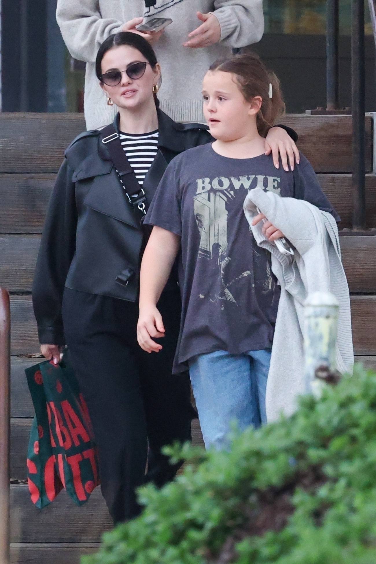 Selena_Gomez_-_Seen_on_a_shopping_trip_with_her_sister_in_Los_Angeles_November_292C_2024_08.jpg