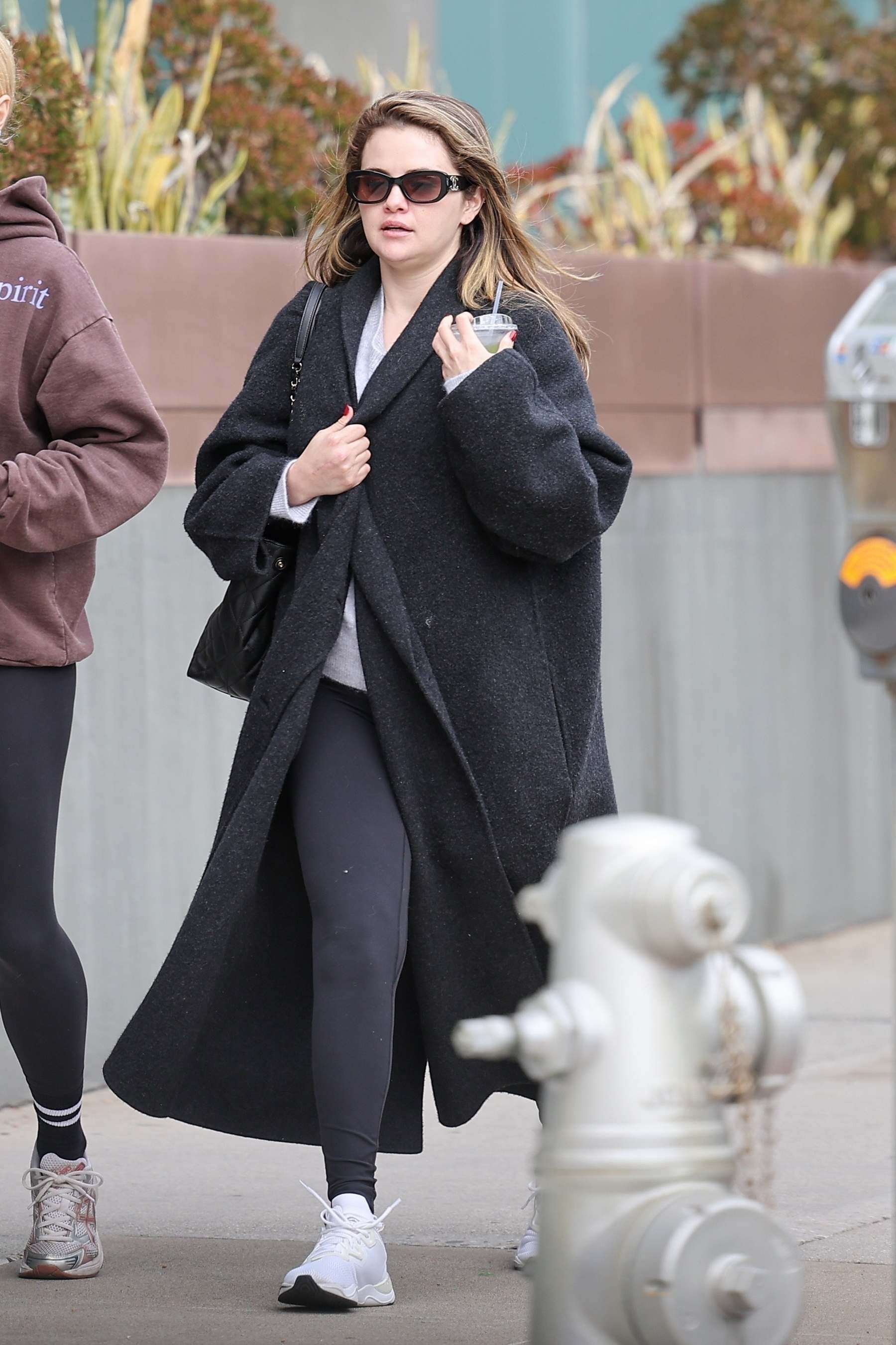 Selena_Gomez_-_at_Kiyono_Sushi_Bar_after_jewelry_shopping_in_Beverly_Hills2C_California__1219202307.jpg