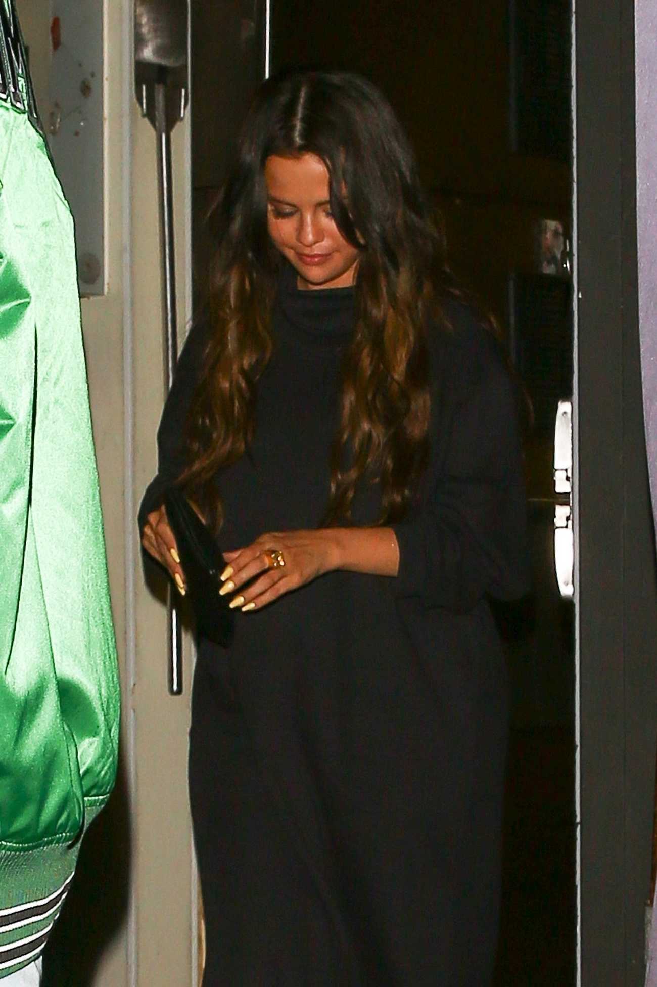 Selena_Gomez_-_leaves_the_Nice_guy_with_Tyga_in_Los_Angeles2C_California__0816202203.jpg