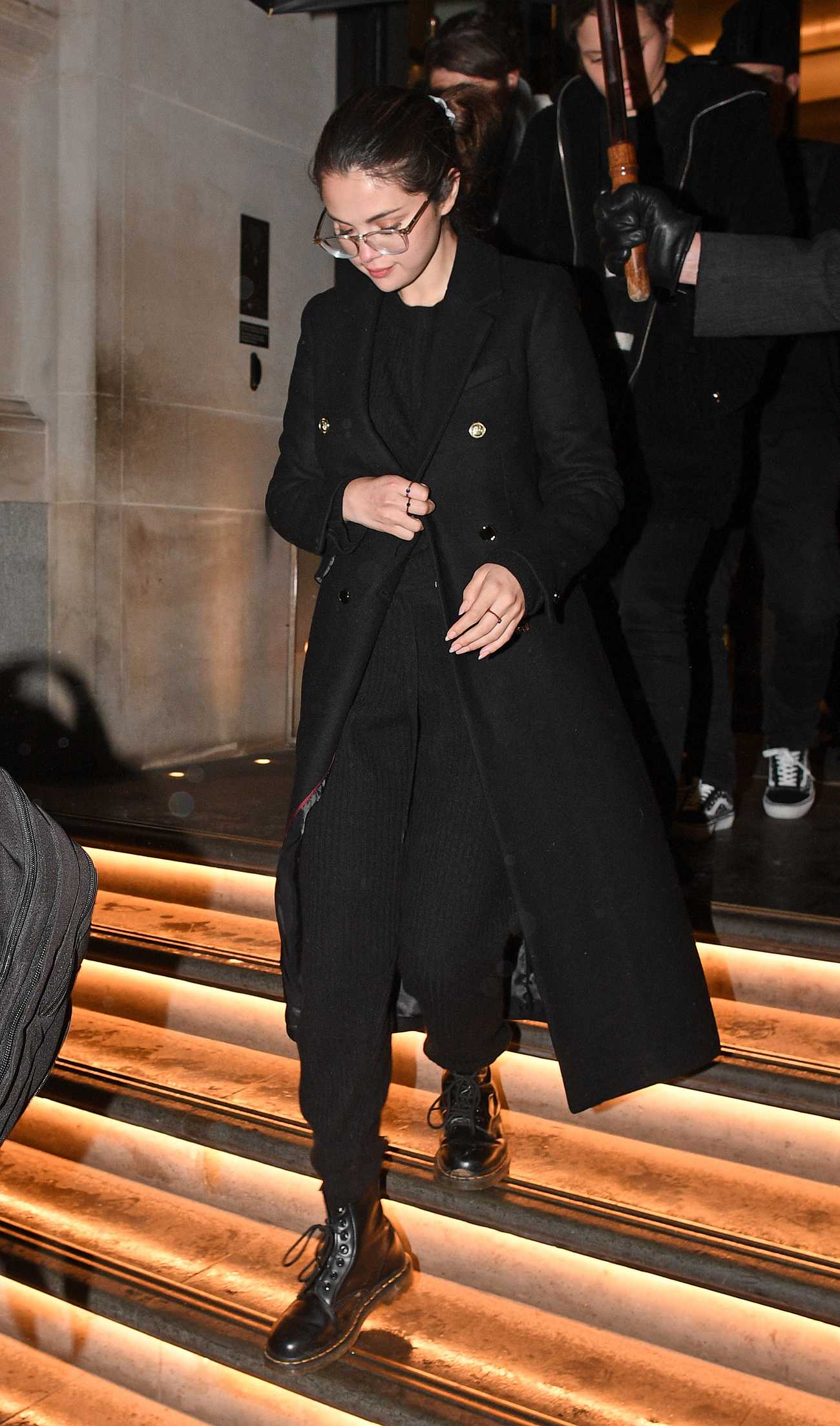 Selena_Gomez_-_seen_leaving_her_hotel_wearing_an_all_black_outfit_in_London2C_England__12102019-04.jpg