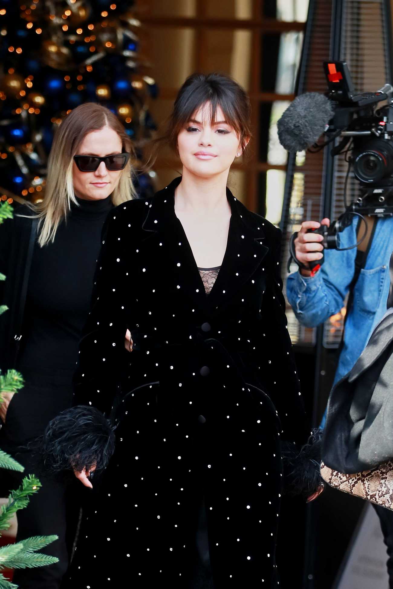 Selena_Gomez_-_seen_leaving_the_Ritz_hotel_in_Paris2C_France__12132019-03.jpg