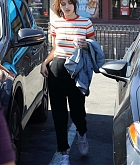 Selena_Gomez_-_At_IHOP_in_Encino2C_CA2C_on_February_7-09.jpg