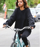 Selena_Gomez_-_Dresses_in_all_black_as_she_goes_on_a_bike_ride_with_a_friend_in_LA_on_November_2-11.jpg
