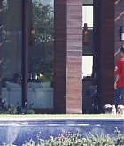 Selena_Gomez_-_Spends_time_with_her_puppy_and_Justin_Bieber_at_a_rental_house_in_LA_October_27-01.jpg