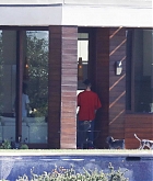 Selena_Gomez_-_Spends_time_with_her_puppy_and_Justin_Bieber_at_a_rental_house_in_LA_October_27-04.jpg