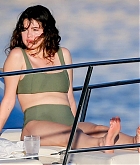 Selena_Gomez_-_stuns_as_she_soaks_up_the_sun_in_a_green_bikini_in_Hawaii2C_HI__12312019-15.jpg